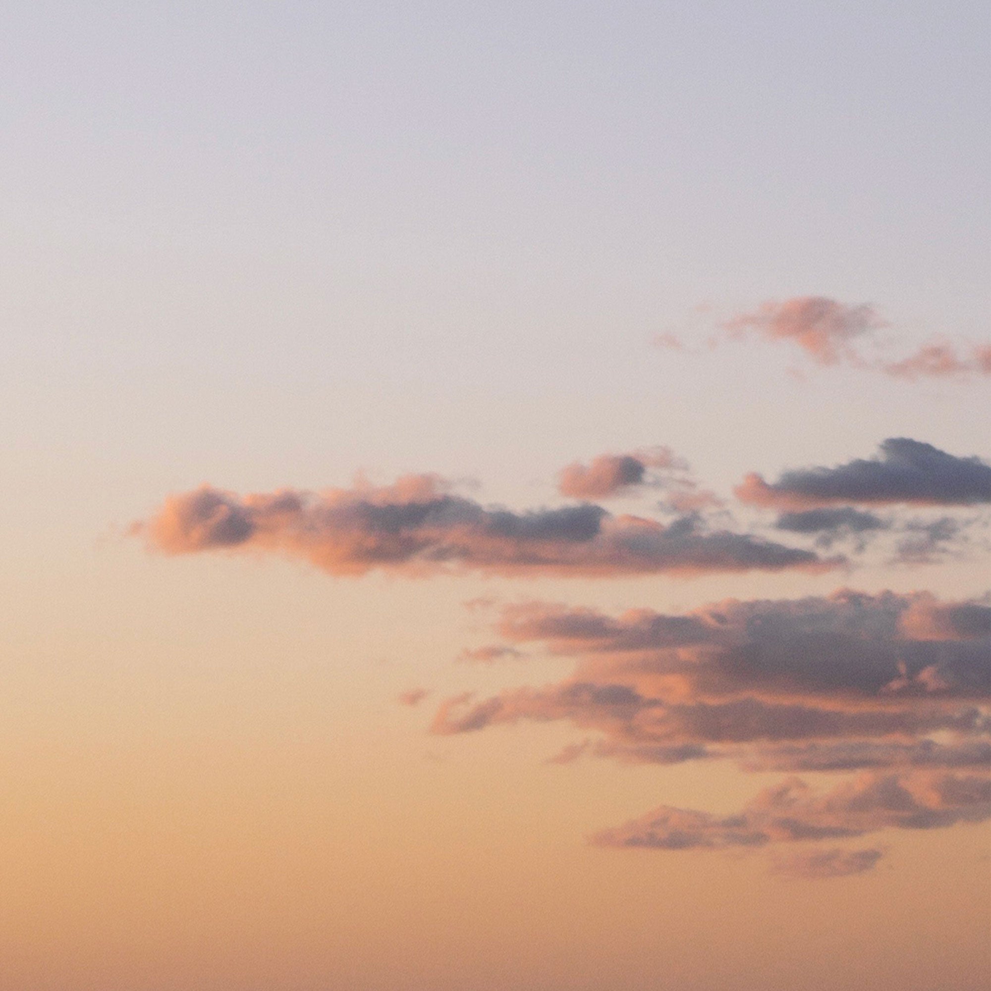 Pink and blue clouds at sunset