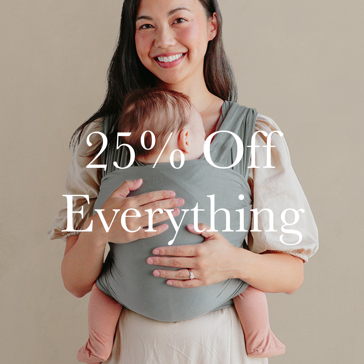 Woman holding a baby in a carrier with promotional text overlay on a beige background