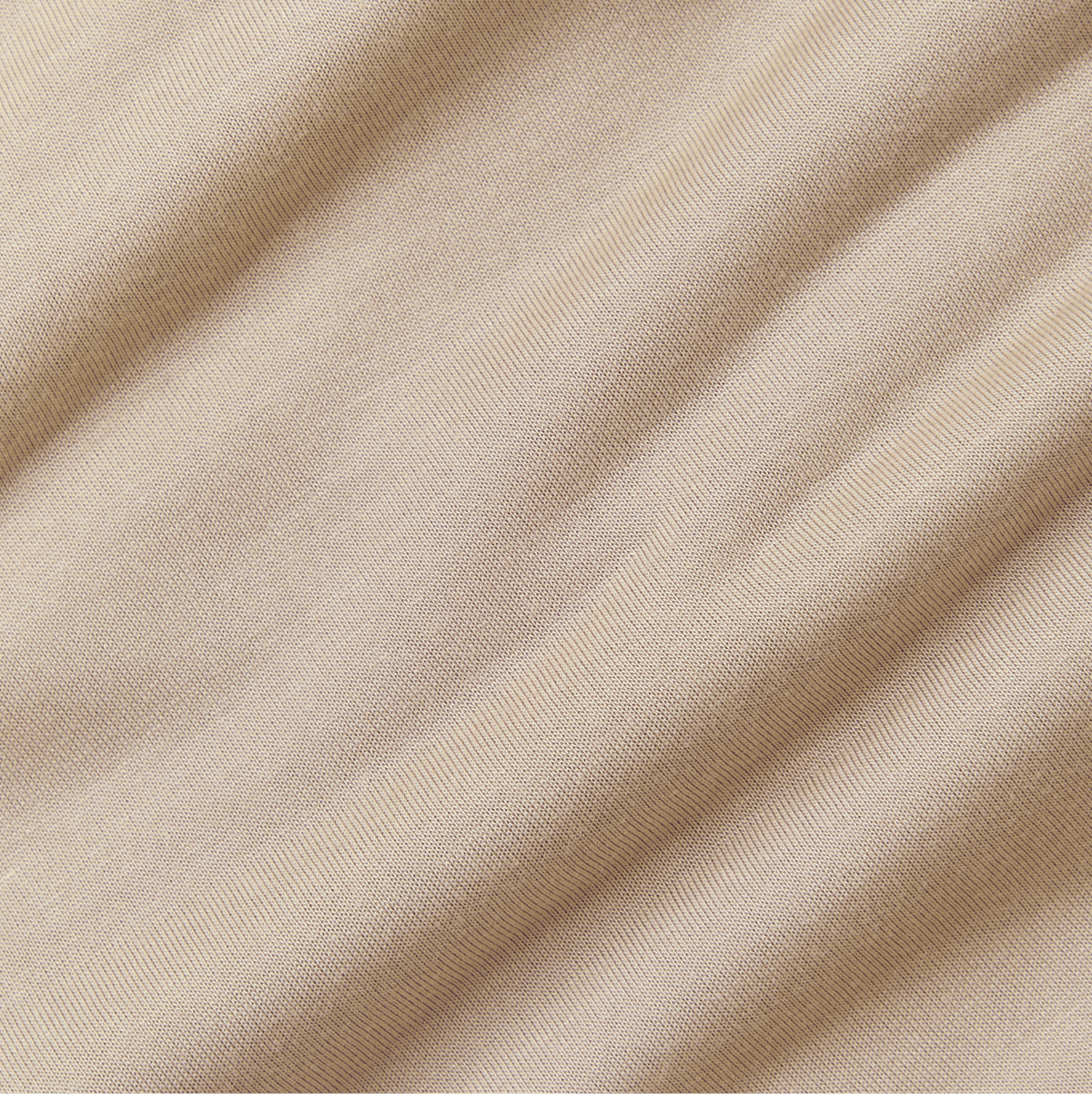 Close-up of beige fabric with visible texture
