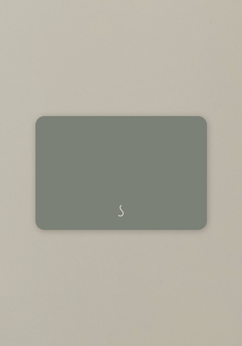 Solly Baby gift card in a muted sage green with the signature 'S' logo. A thoughtful way to give the gift of comfort, connection, and cozy essentials.