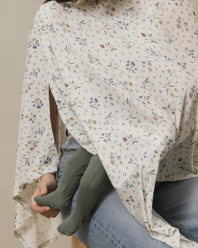 Close up on cream nursing cover with multi-color flower print