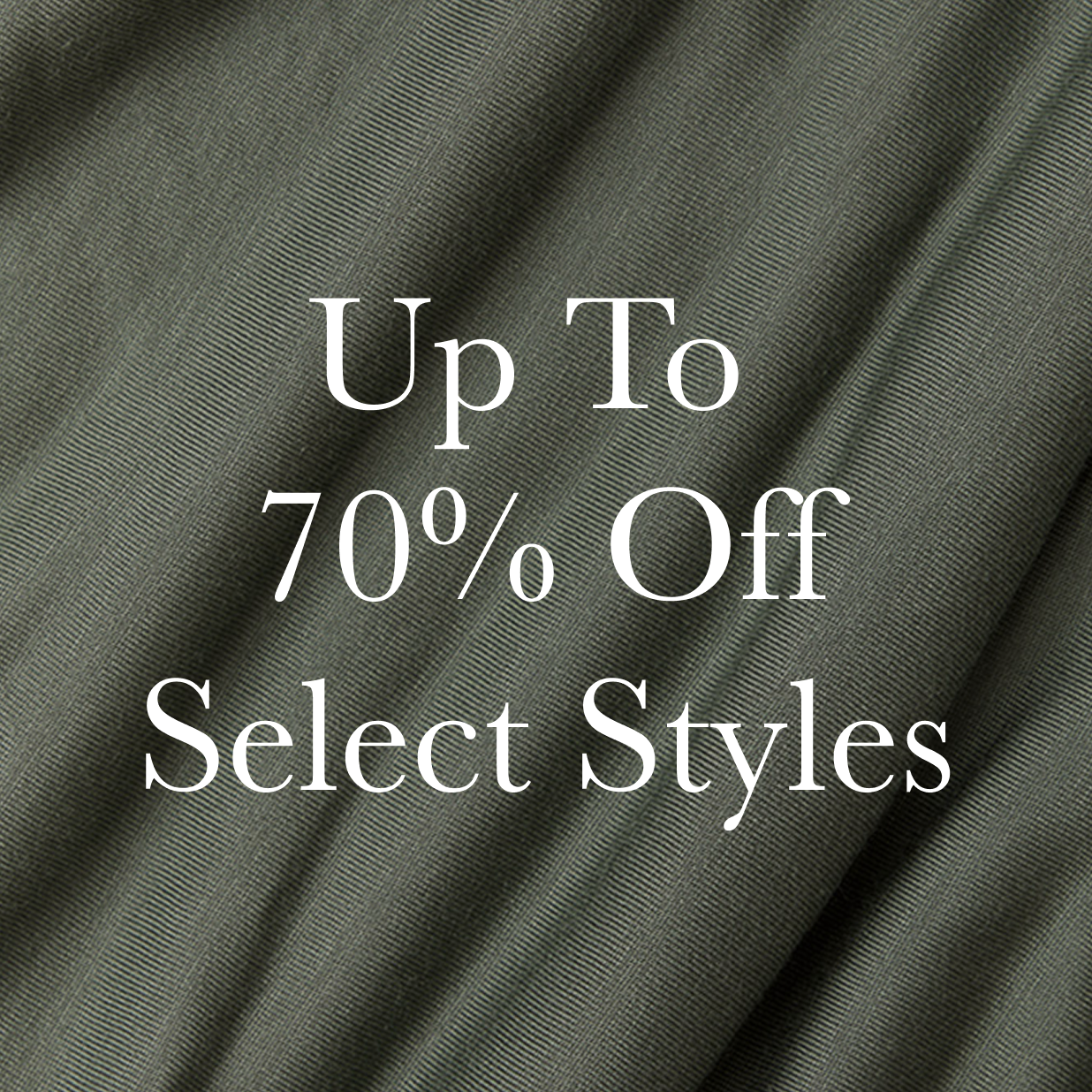 Text 'Up To 70% Off Select Styles' on a dark fabric background